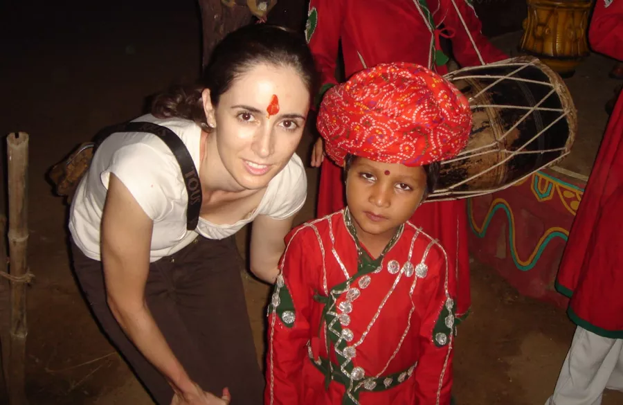 Volunteer talking with coordinator and children in Jaipur
