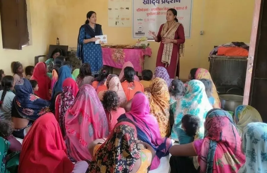 Mothers group session on nutrition and child health with volunteer support